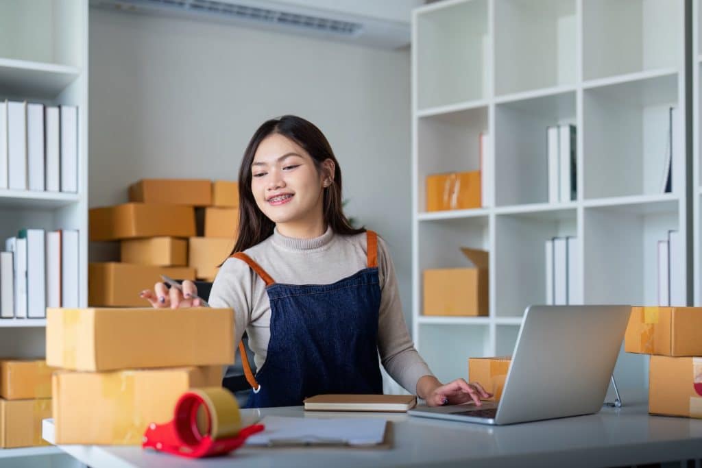 A small business owner working on her logistics strategy