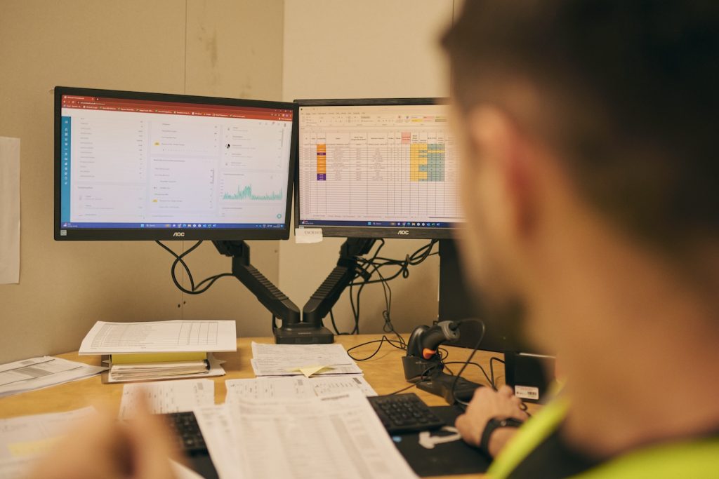 One of the team at Delta Fulfilment forecasting customer demand using software that integrates with eCommerce platforms like Amazon, eBay and Shopify.