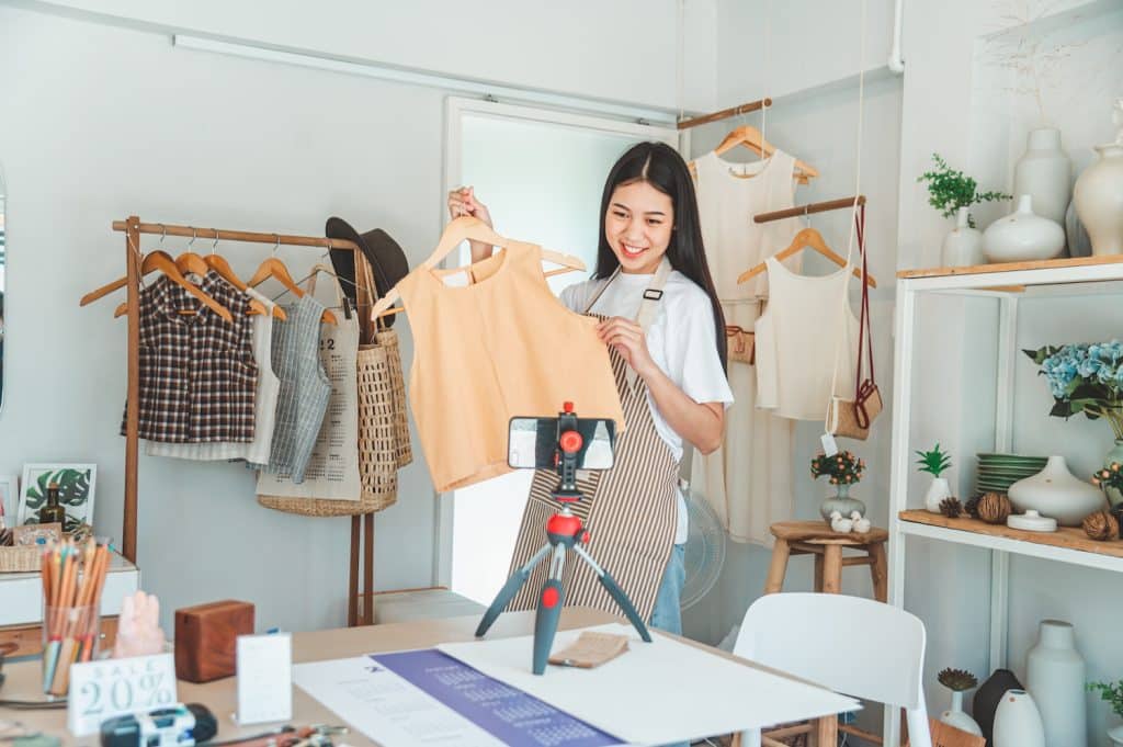 an ecommerce business owner on tiktok live, showing you how to sell on tiktok shop