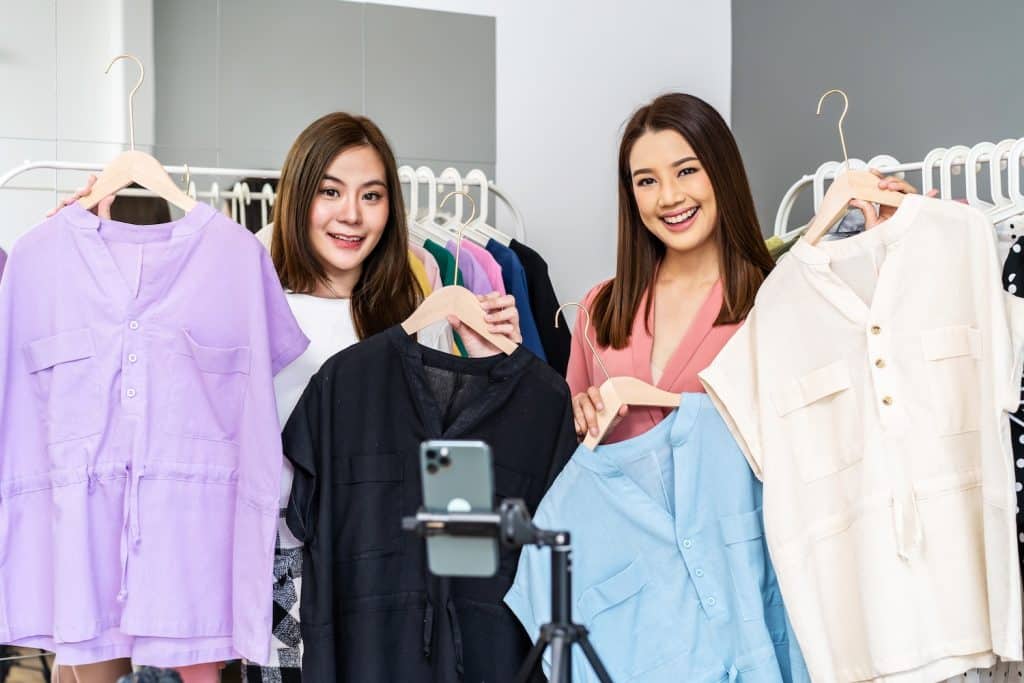 two asian women demonstrating what to sell on tiktok shop