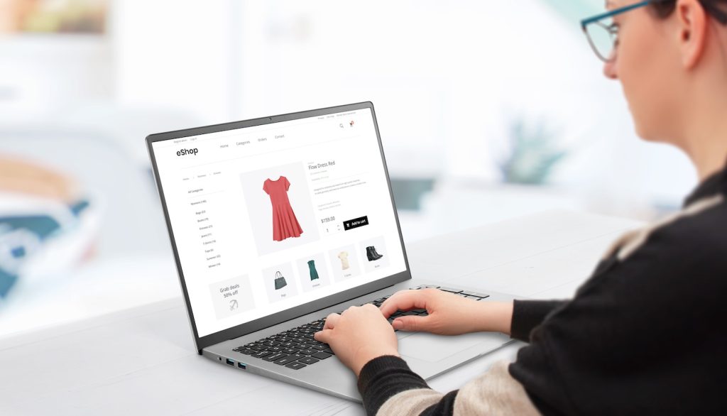 A store owner working on their eCommerce platform to represent ‘The Best eCommerce Platforms for Subscription-Based Businesses’